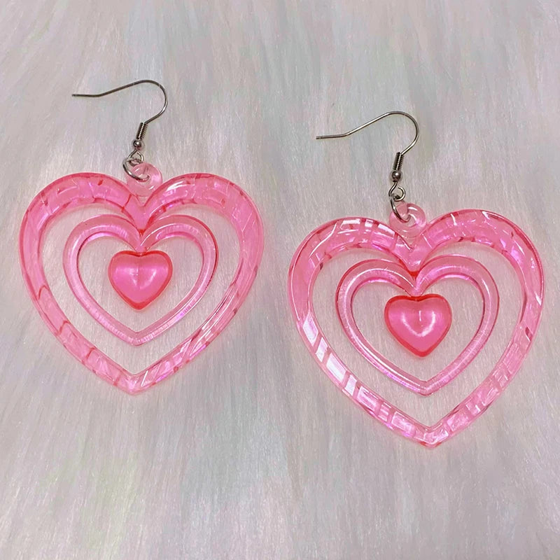 Neon pink acrylic heart earrings