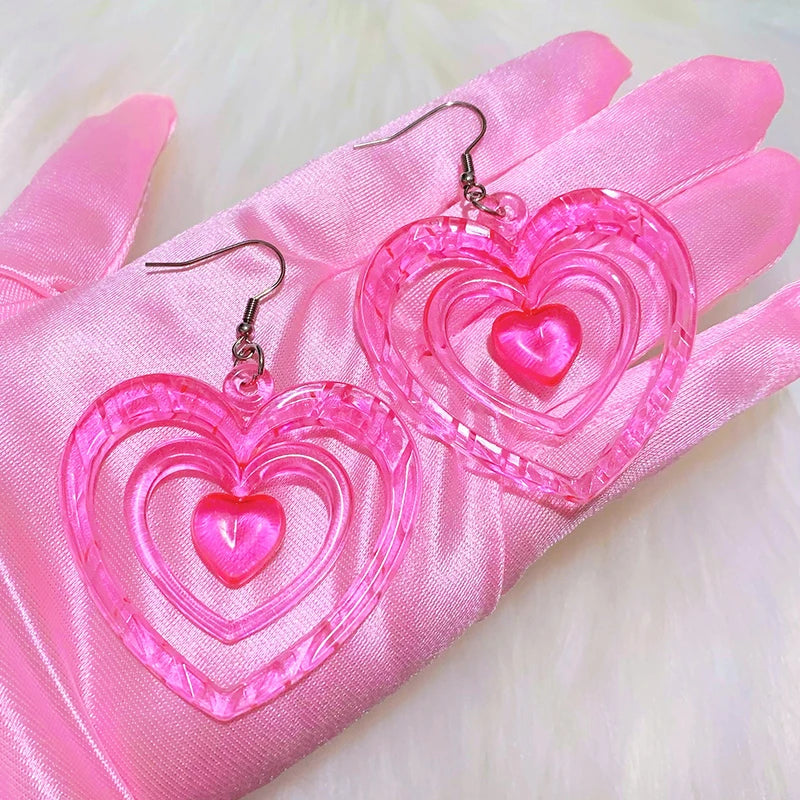 Neon pink acrylic heart earrings