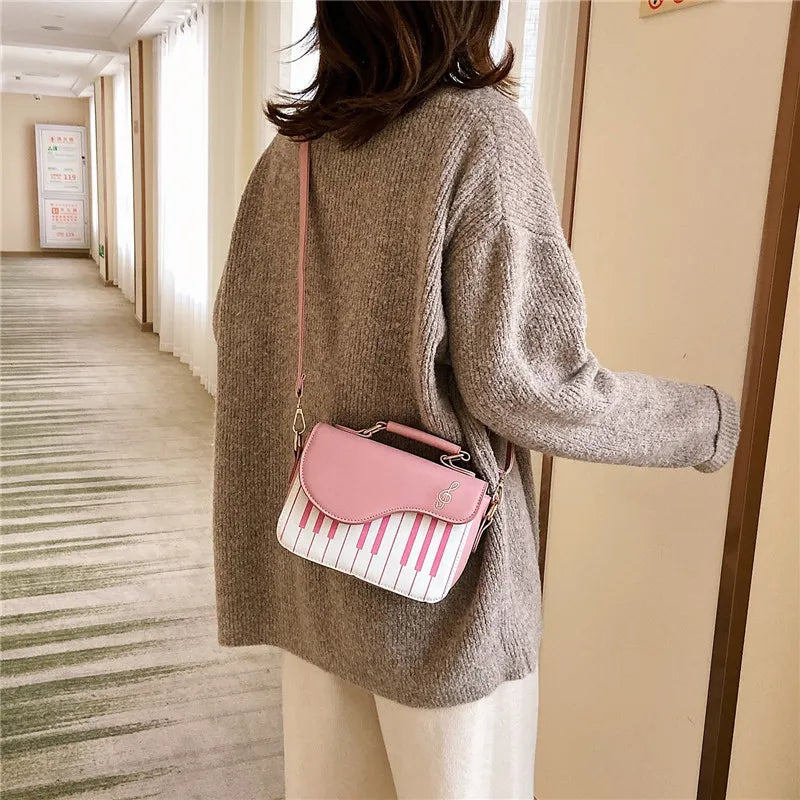 Piano crossbody & handbag