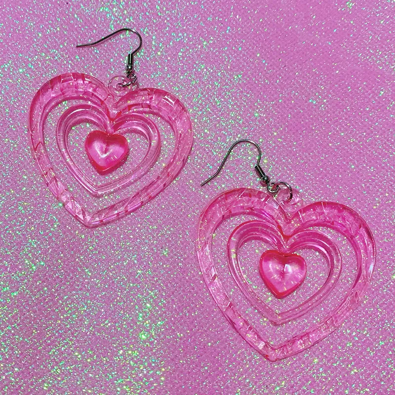 Neon pink acrylic heart earrings