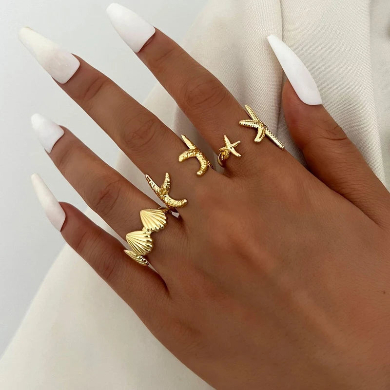 Vintage Gold Ring Set – 8-Piece Bohemian Flower, Shell & Geometric Design