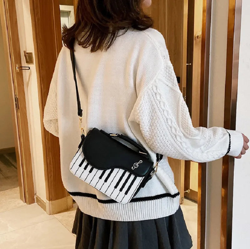 Piano crossbody & handbag