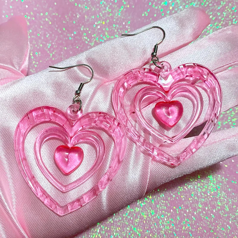 Neon pink acrylic heart earrings